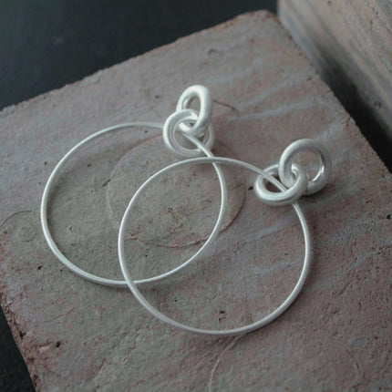 DNSK - Tula Statement Hoop Earrings in Silver