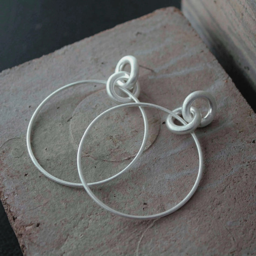 DNSK - Tula Statement Hoop Earrings in Silver