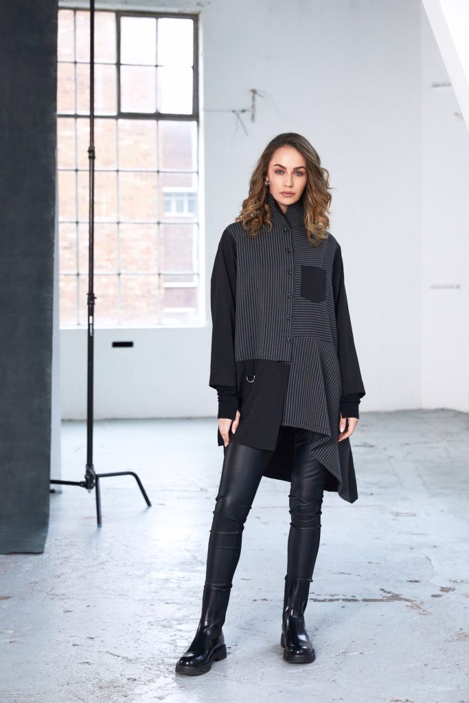 naya-womens-stripped-blouse-with-angled-hem-and-contrast-sleeve-plus-panels-naw25191-in-black-grey