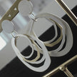 dnsk-elysian-2-tone-statement-earring-in-silver-plating-or-gold-plating
