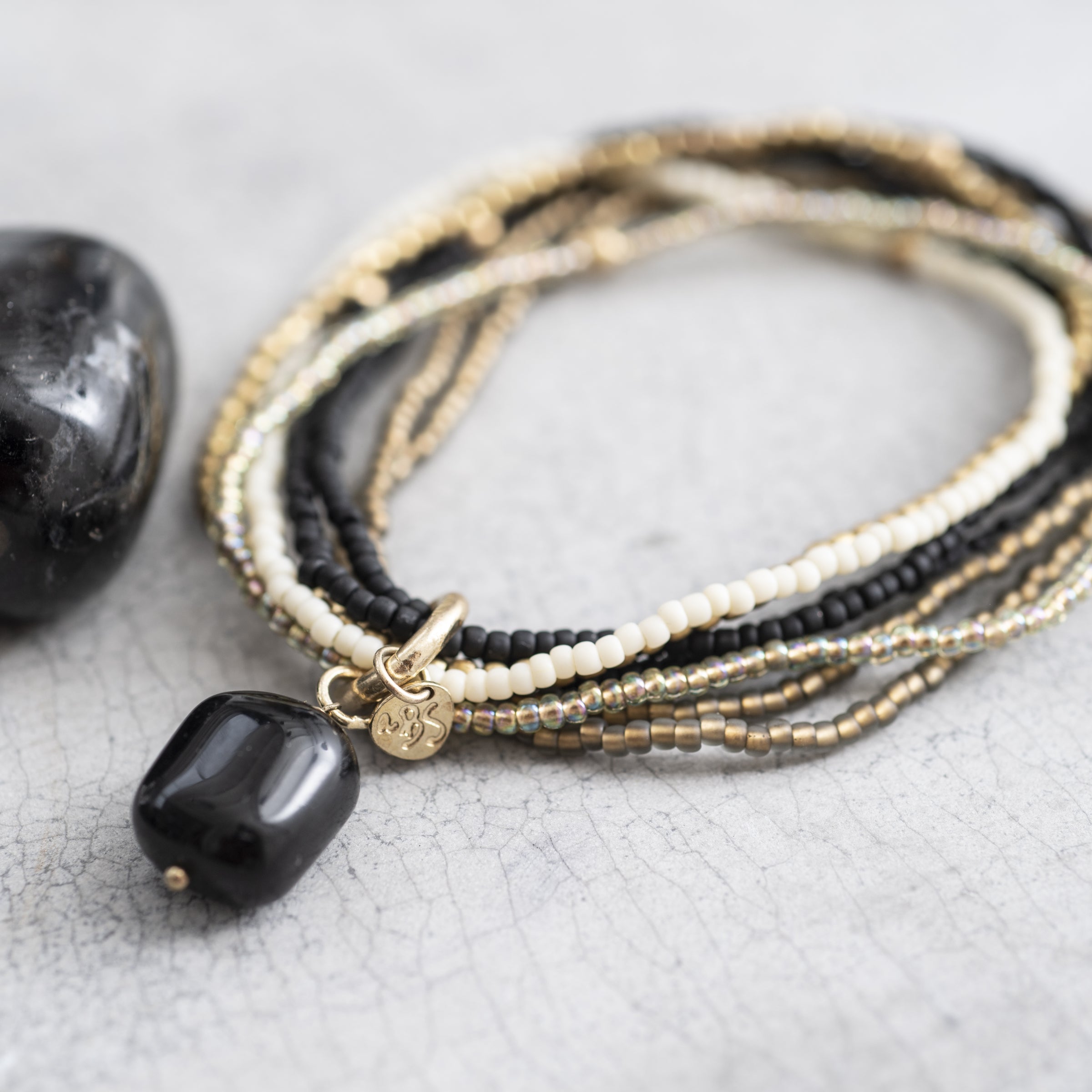 A Beautiful Story - Nirmala Black Onyx Gold Bracelet